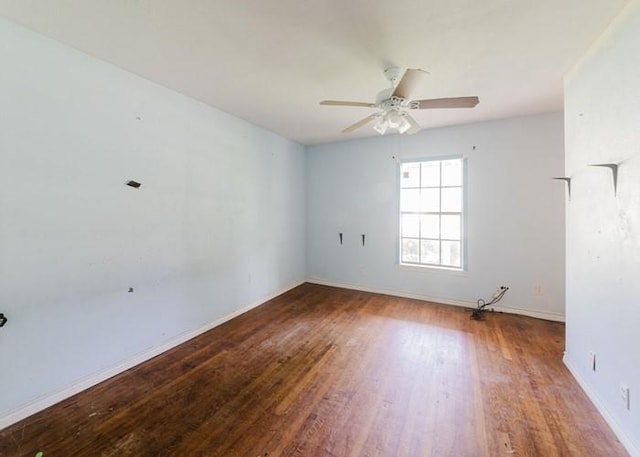222 E Southland Ave, Alvin, TX 77511 - empty room with a ceiling fan and wood finished floors