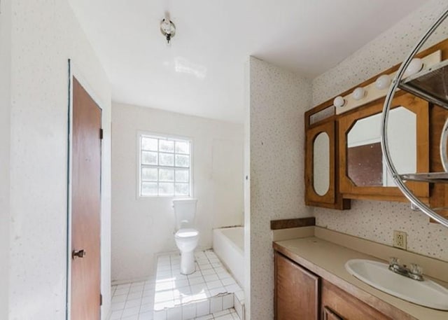 222 E Southland Ave, Alvin, TX 77511 - full bathroom featuring vanity, tile patterned flooring, and shower / washtub combination
