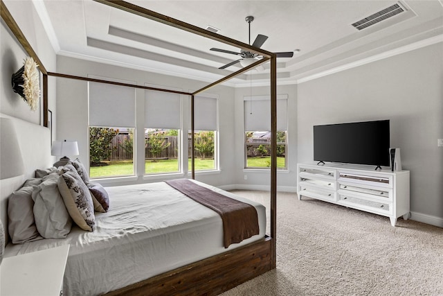 13819 Windward Harbor Ct, Houston, TX 77059 - carpeted bedroom with a raised ceiling, crown molding, and ceiling fan