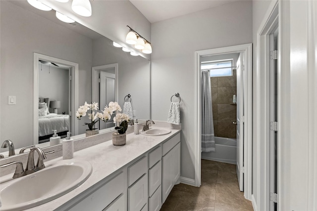 13819 Windward Harbor Ct, Houston, TX 77059 - ensuite bathroom with double vanity, shower / tub combo, and tile patterned flooring