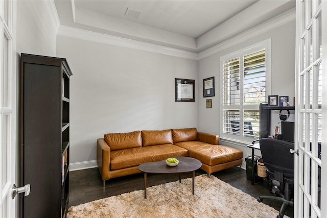 13819 Windward Harbor Ct, Houston, TX 77059 - living area featuring a desk, a tray ceiling, dark wood-style floors, and crown molding