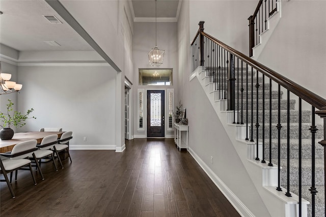 13819 Windward Harbor Ct, Houston, TX 77059 - entrance foyer with a chandelier, stairway, hardwood / wood-style floors, a towering ceiling, and ornamental molding