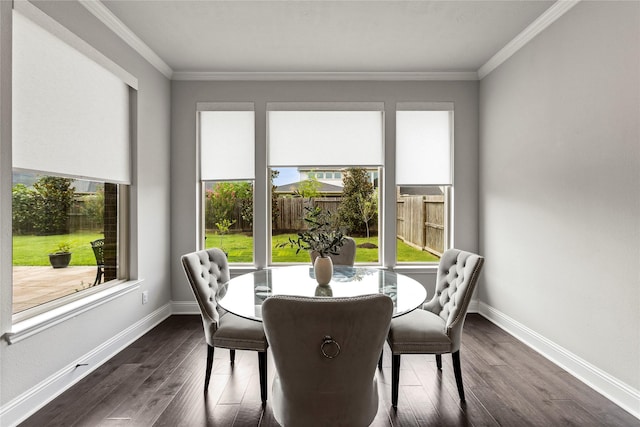 13819 Windward Harbor Ct, Houston, TX 77059 - dining area featuring healthy amount of natural light, dark wood-type flooring, and ornamental molding