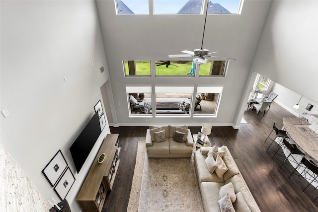 13819 Windward Harbor Ct, Houston, TX 77059 - living room with a high ceiling, wood finished floors, and a ceiling fan