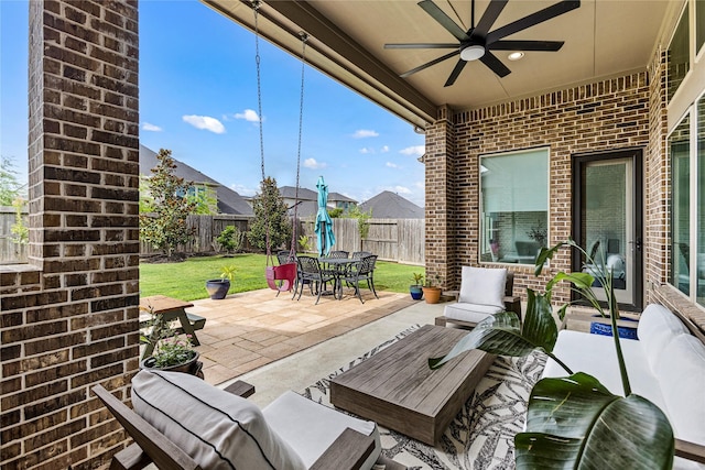 13819 Windward Harbor Ct, Houston, TX 77059 - fenced backyard with an outdoor hangout area, a ceiling fan, outdoor dining space, and a patio area