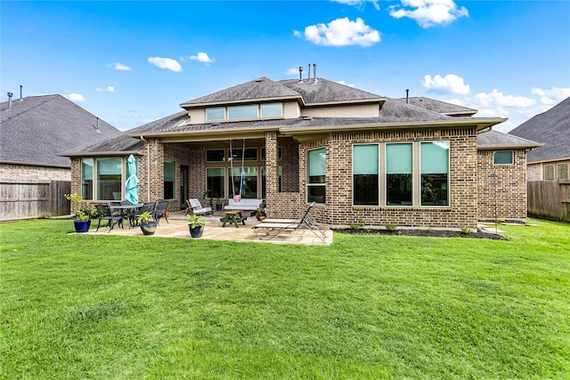 13819 Windward Harbor Ct, Houston, TX 77059 - back of house with a fenced backyard, brick siding, a patio area, and roof with shingles