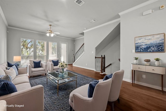 2338 Bastrop St, Houston, TX 77004 - living room with wood finished floors, stairs, crown molding, and ceiling fan