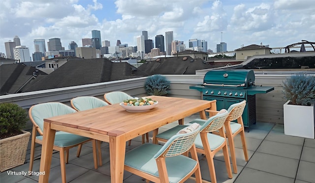 2338 Bastrop St, Houston, TX 77004 - view of patio with area for grilling, outdoor dining area, and a view of skyline