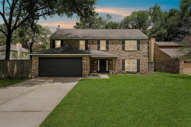 3715 Ember Spring Dr, Kingwood, TX 77339 - view of front of house with driveway, an attached garage, brick siding, and a shingled roof