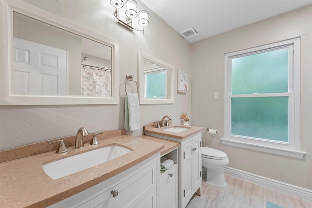 3715 Ember Spring Dr, Kingwood, TX 77339 - full bathroom featuring vanity and wood finished floors