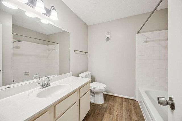 7350 Kirby Dr Unit 46, Houston, TX 77030 - full bath with wood finished floors, vanity, and shower / tub combination
