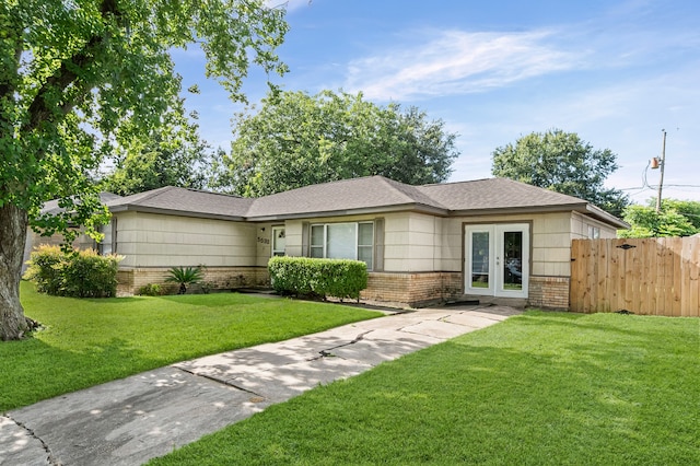 5532 Meadow Creek Ln, Houston, TX 77017 - ranch-style home with brick siding, french doors, and a shingled roof