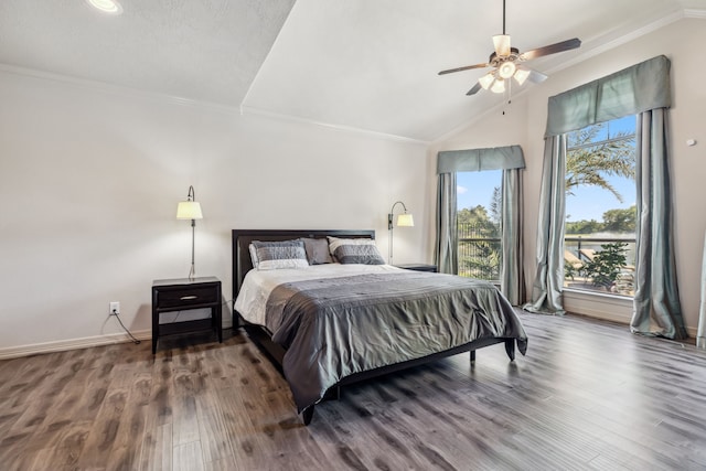 8411 Middle Canyon Rd, Katy, TX 77494 - bedroom with crown molding, wood finished floors, lofted ceiling, and a ceiling fan