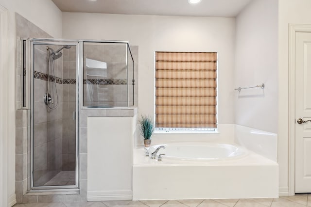 8411 Middle Canyon Rd, Katy, TX 77494 - full bath with a bath, a shower stall, tile patterned flooring, and recessed lighting