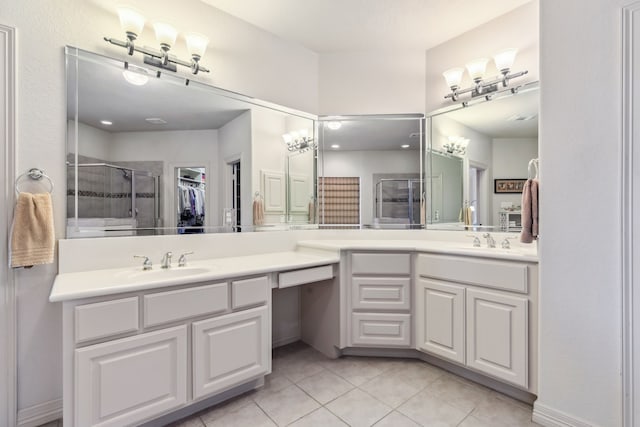 8411 Middle Canyon Rd, Katy, TX 77494 - full bath with vanity, a shower stall, tile patterned flooring, and a walk in closet