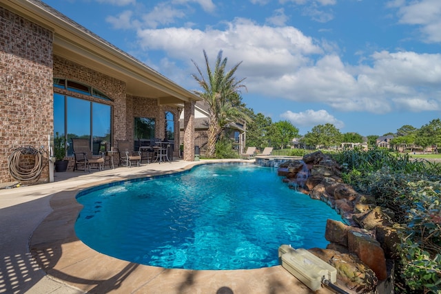 8411 Middle Canyon Rd, Katy, TX 77494 - swimming pool featuring a patio and outdoor dining area