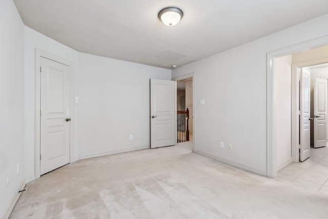 8411 Middle Canyon Rd, Katy, TX 77494 - spare room with light colored carpet and baseboards