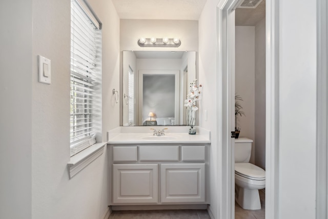 8411 Middle Canyon Rd, Katy, TX 77494 - bathroom featuring vanity, healthy amount of natural light, and tile patterned floors