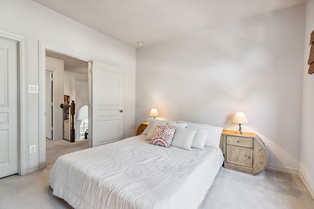8411 Middle Canyon Rd, Katy, TX 77494 - bedroom with light carpet and baseboards