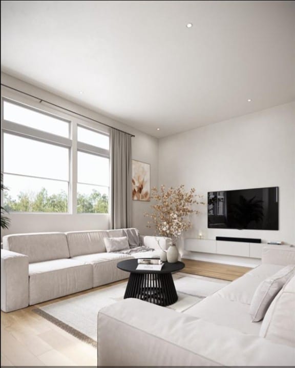 1739 Mary St, Houston, TX 77026 - living room featuring wood finished floors and recessed lighting