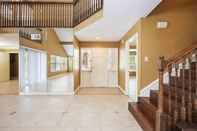 11510 Pagoda Dr, Houston, TX 77477 - entrance foyer with tile patterned flooring, a towering ceiling, stairway, and recessed lighting