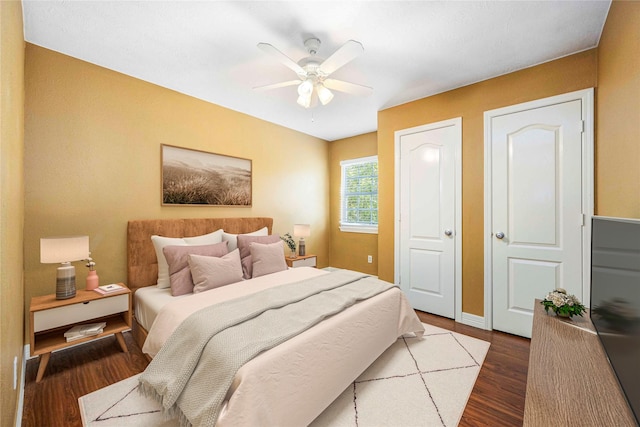 11510 Pagoda Dr, Houston, TX 77477 - bedroom featuring dark wood-type flooring and ceiling fan