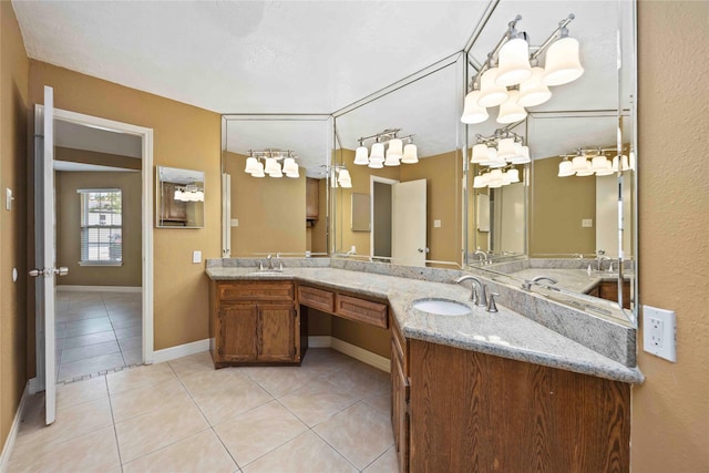 11510 Pagoda Dr, Houston, TX 77477 - bathroom featuring tile patterned floors and double vanity