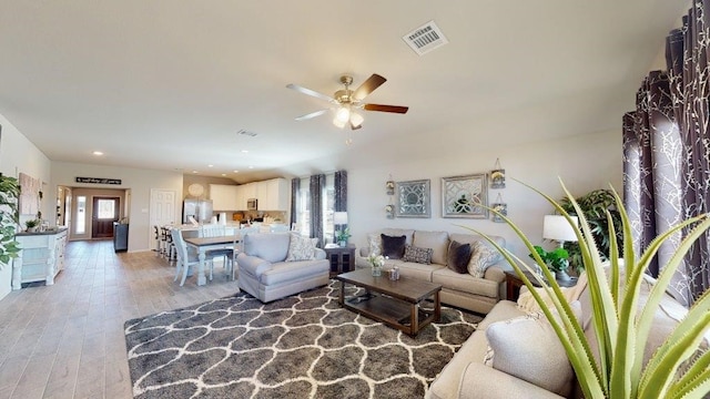 2118 Sanders Brook Dr, Baytown, TX 77521 - living area with a ceiling fan, light wood-style floors, and recessed lighting