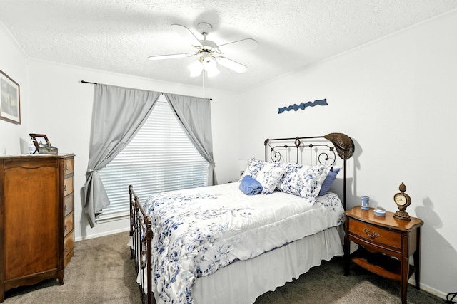 100 Edgewater Dr Unit 39, Livingston, TX 77351 - bedroom with carpet floors, a textured ceiling, and a ceiling fan