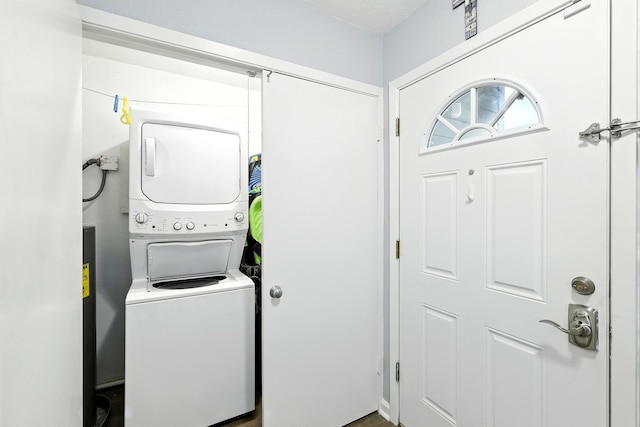 100 Edgewater Dr Unit 39, Livingston, TX 77351 - washroom with stacked washer / dryer