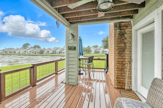 100 Edgewater Dr Unit 39, Livingston, TX 77351 - porch with a yard, a residential view, and a water view
