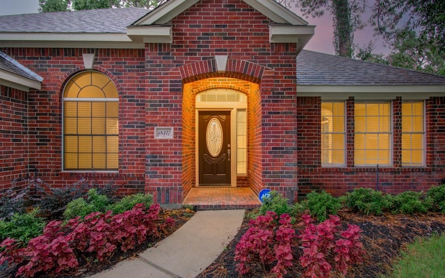 18327 Bluewater Cove Dr, Humble, TX 77346 - property entrance featuring brick siding and a shingled roof