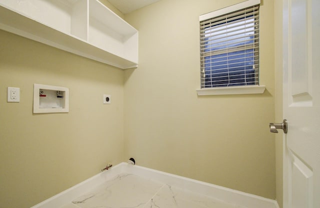18327 Bluewater Cove Dr, Humble, TX 77346 - laundry area featuring gas dryer hookup, hookup for a washing machine, marble finish flooring, and hookup for an electric dryer