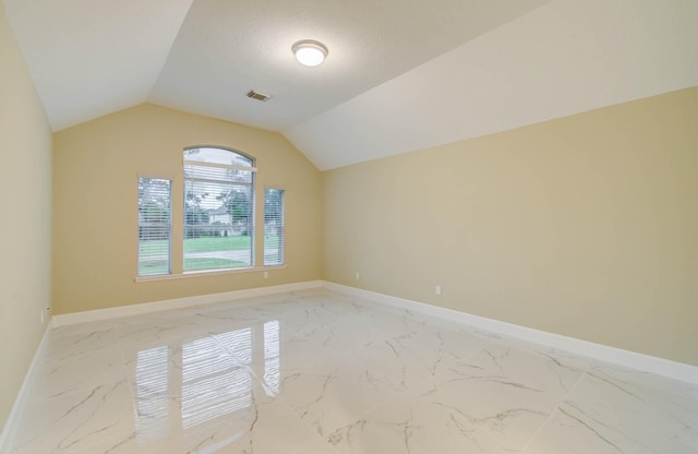 18327 Bluewater Cove Dr, Humble, TX 77346 - bonus room featuring light marble finish flooring and lofted ceiling