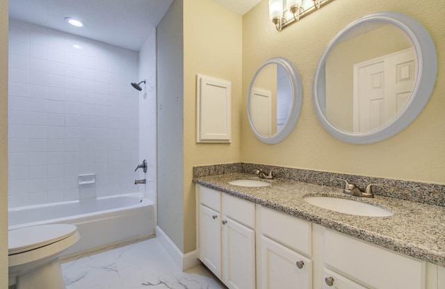 18327 Bluewater Cove Dr, Humble, TX 77346 - full bathroom featuring marble look tile flooring, double vanity, shower / washtub combination, and recessed lighting