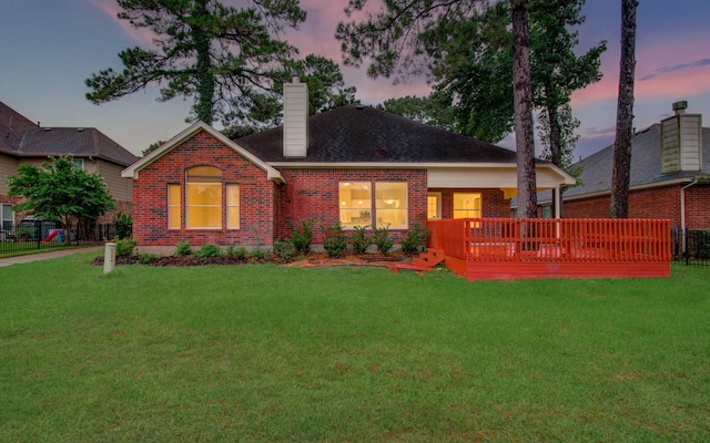 18327 Bluewater Cove Dr, Humble, TX 77346 - ranch-style home with brick siding, a chimney, a wooden deck, and roof with shingles