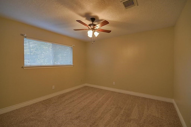 2903 Valley Rose Dr, Kingwood, TX 77339 - spare room with ceiling fan, carpet flooring, and a textured ceiling
