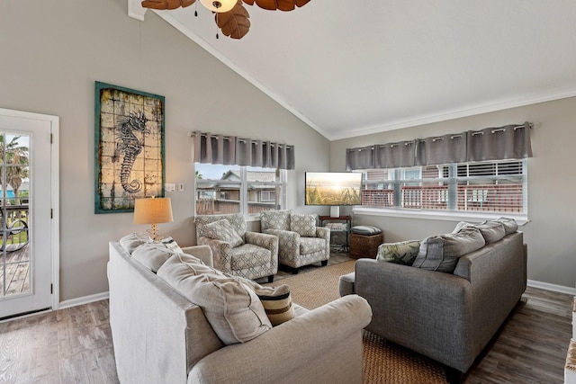 4004 Ector Dr, Galveston, TX 77554 - living area with healthy amount of natural light, wood finished floors, crown molding, a ceiling fan, and high vaulted ceiling