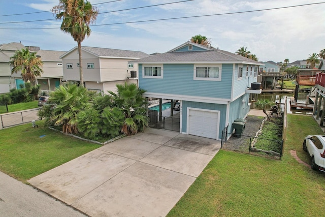 4004 Ector Dr, Galveston, TX 77554 - coastal inspired home with a garage, driveway, a shingled roof, and a residential view