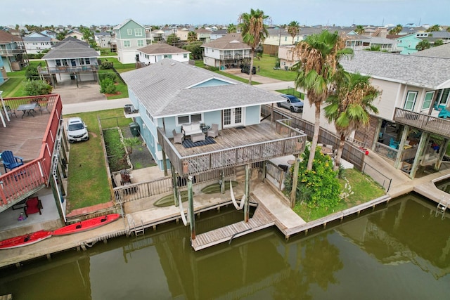 4004 Ector Dr, Galveston, TX 77554 - dock area with a residential view, a deck with water view, and a fenced backyard