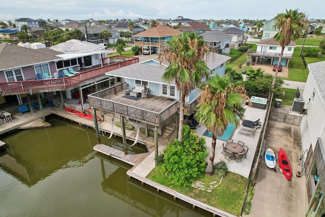 4004 Ector Dr, Galveston, TX 77554 - aerial view of residential area featuring a large body of water