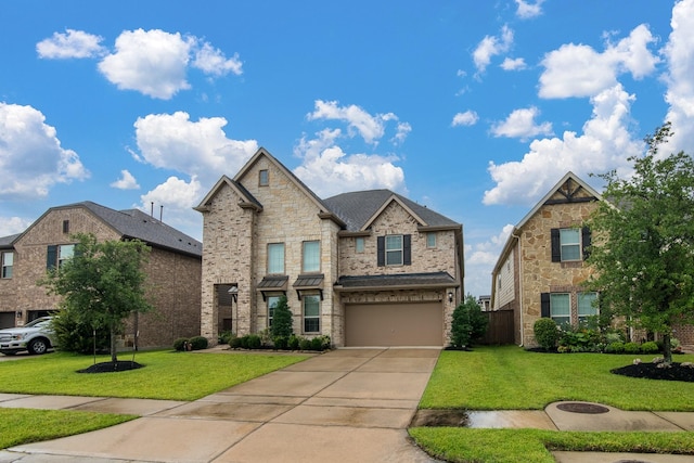 21207 Bradford Grove Dr, Spring, TX 77379 - view of front facade featuring a garage, driveway, a front yard, and brick siding