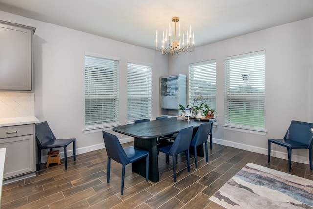 21207 Bradford Grove Dr, Spring, TX 77379 - dining room featuring a chandelier and dark wood-style floors