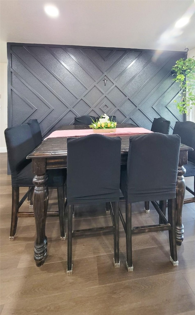 606 E Ahldag St, Wharton, TX 77488 - dining space featuring wood finished floors