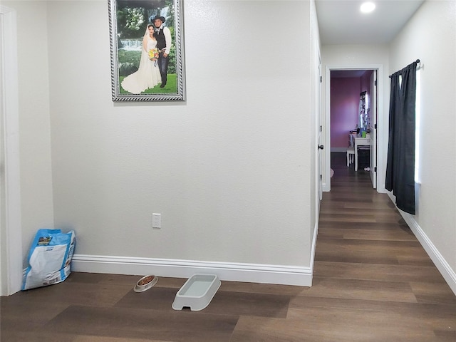 606 E Ahldag St, Wharton, TX 77488 - hallway with wood finished floors and recessed lighting