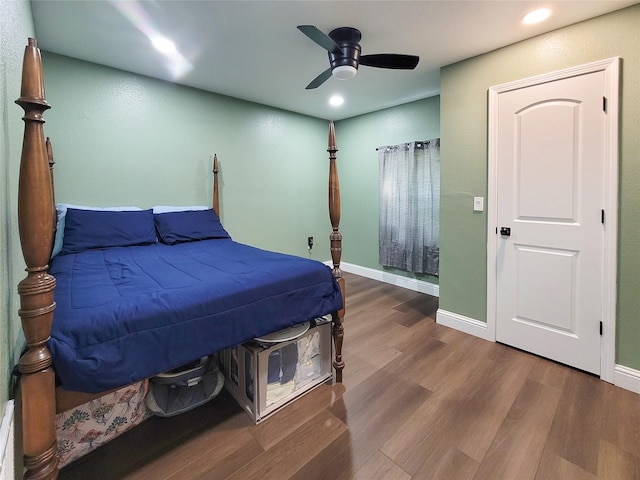 606 E Ahldag St, Wharton, TX 77488 - bedroom with wood finished floors, recessed lighting, and a ceiling fan