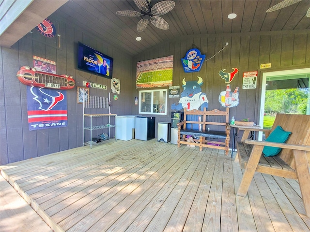 606 E Ahldag St, Wharton, TX 77488 - recreation room featuring ceiling fan, wood walls, wooden ceiling, and hardwood / wood-style floors