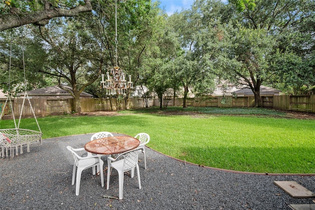 7615 Sandygate Ln, Houston, TX 77095 - fenced backyard with a patio area