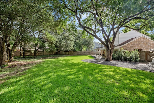 7615 Sandygate Ln, Houston, TX 77095 - fenced backyard featuring a patio
