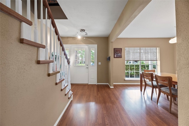7615 Sandygate Ln, Houston, TX 77095 - foyer entrance with wood finished floors and stairs